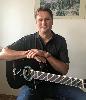 Prof. Gitarrenunterricht mit Gesang (auch online) in München