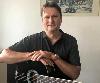 Prof. Gitarrenunterricht mit Gesang (auch online) in München