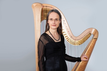 Sagenumwobenes München - die Laimer Geschichtenerzählerin Heike Pahl und Barbara Pöschl-Edrich an der Harfe in der Stadtbibliothek Laim